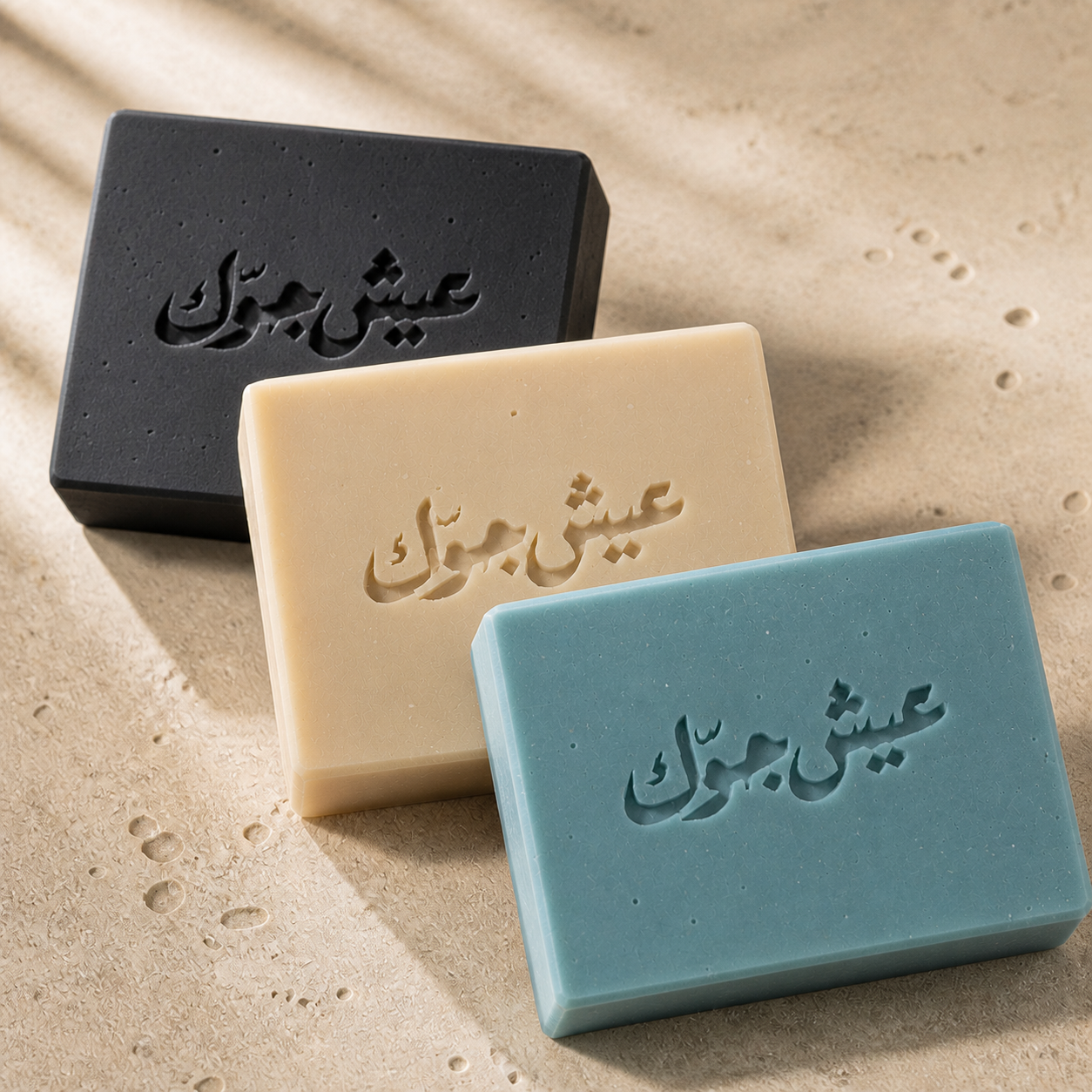 Close view of Moroccan Mint, Cashmere Cream, and Black Salt Arabian Soap Bar textures