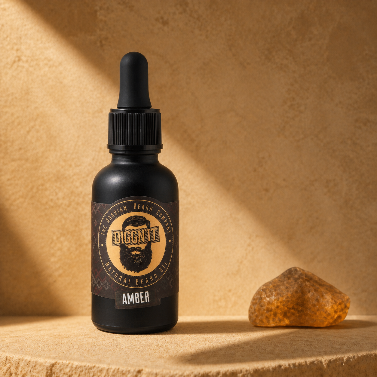 Diggn'It Amber Arabian Beard Oil bottle on a warm amber mineral backdrop