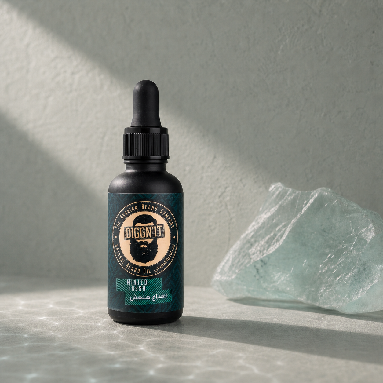 Diggn'It Minted Fresh Arabian Beard Oil bottle on a cool mineral backdrop