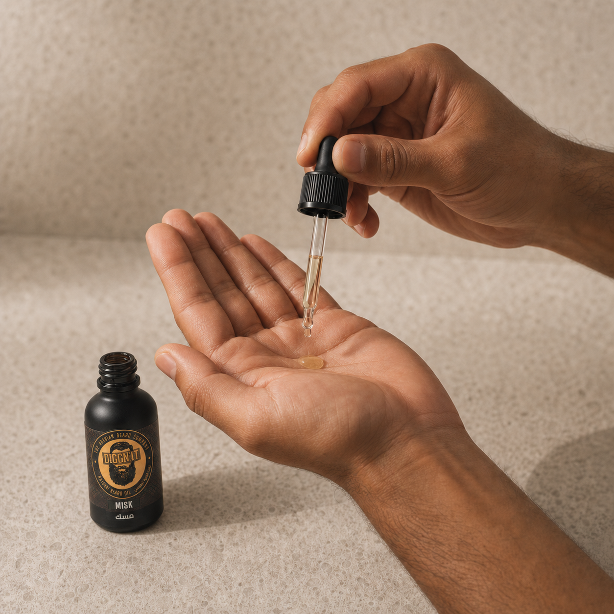 Diggn'It Misk Arabian Beard Oil being dispensed into an open palm