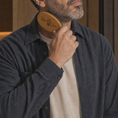 Real Bamboo Beard Brush bristles moving through beard hair